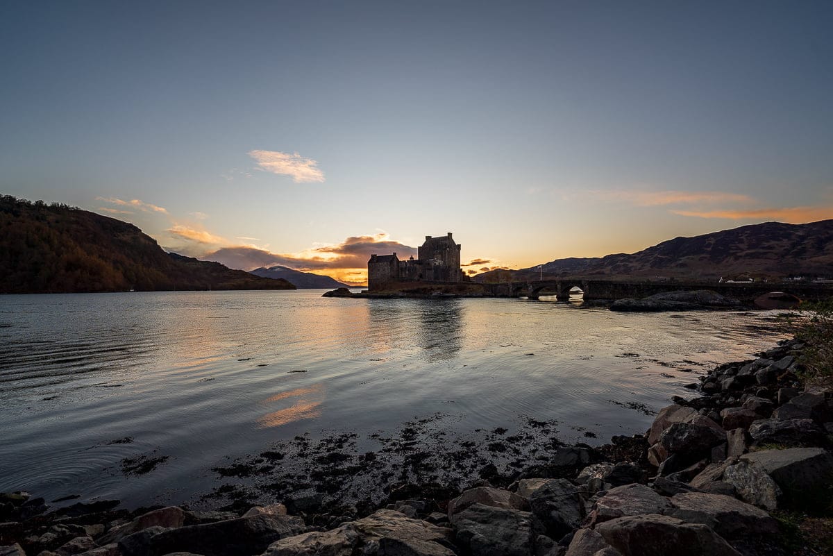 Eilean Donan Castle at Sunset, taken by The Luxury Travelers during a Scotland Road Trip
