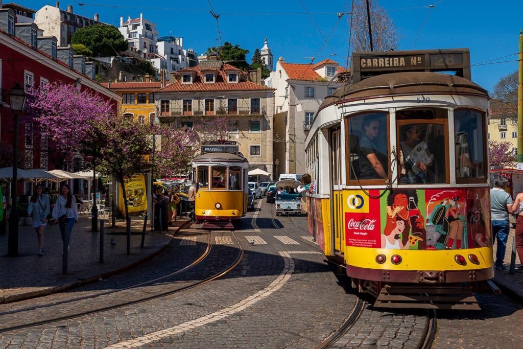 Trams through Alfama Neighborhood, Lisbon Transportation Guide - The Luxury Travelers