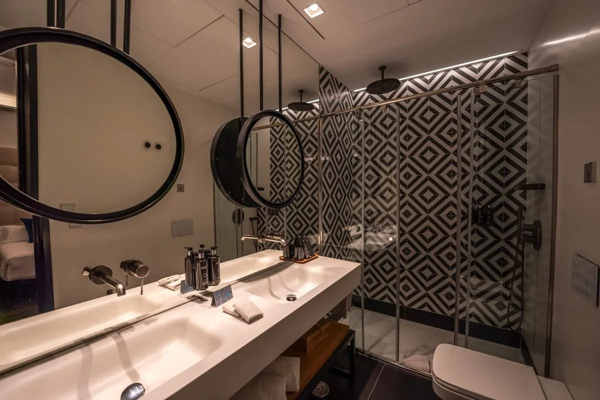 Bathroom of a Double Room with Patio View in Hotel Regina Madrid - Best Luxury and Boutique Hotels in Central Madrid, Spain